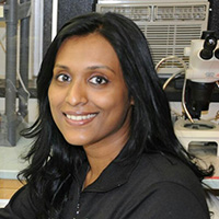 Profile photo of Dr. Febina Mathew in her lab.