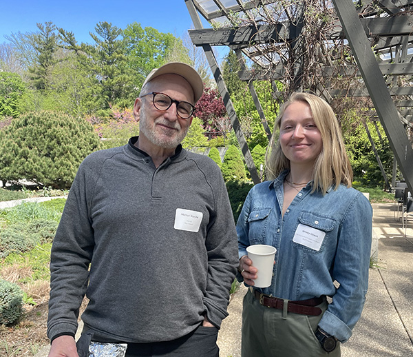 Michael Rozyne and Kelsey Gosch standing together outside at the botanical garden