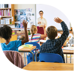 School classroom with teacher and students.